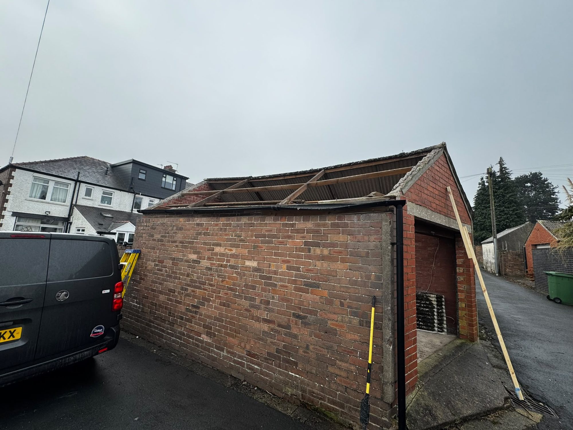 After brick garage asbestos roof sheet removal in Anglesey